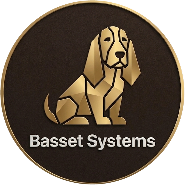 Basset Systems logo: a gold geometric basset hound on a dark badge